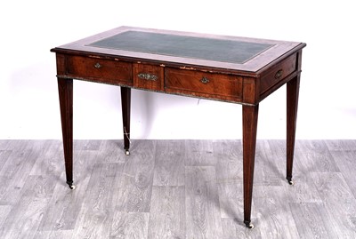 Lot 31 - A Louis XVI-style walnut and burr walnut inlaid library table