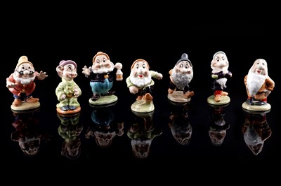 Lot 362 - A set of seven Beswick Walt Disney Seven Dwarves