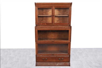 Lot 74 - An early 20th Century sectional bookcase