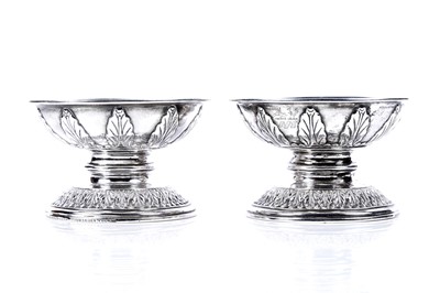 Lot 644 - A pair of Edwardian silver Garrard & Co candle stands