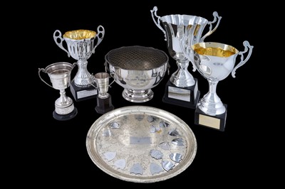 Lot 422 - A collection of five silver plated trophies; and other items