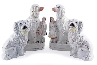 Lot 271 - Two pairs of unusual Staffordshire dogs