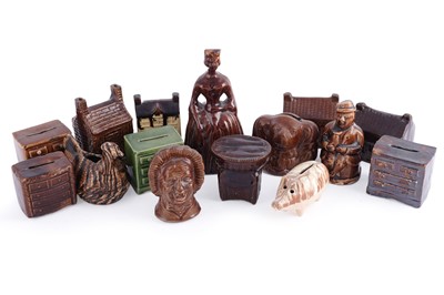 Lot 311 - An interesting collection of Victorian treacle glaze money boxes