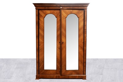 Lot 12 - A mid-19th Century Biedermeier walnut armoire
