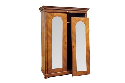 Lot 12 - A mid-19th Century Biedermeier walnut armoire
