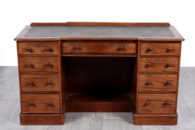 Lot 12 - A Victorian mahogany inverted breakfront kneehole desk