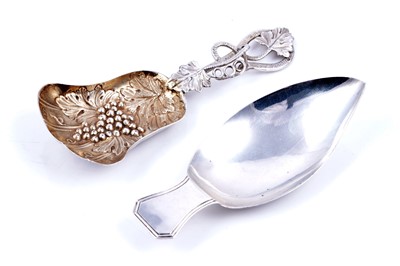Lot 289 - A Victorian Irish silver tea caddy spoon; and a George III caddy spoon