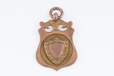 Lot 212 - A 1920s 9ct rose gold fob medallion