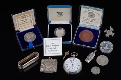 Lot 378 - A Victorian silver pocket watch, fob items; and royal commemorative silver coins