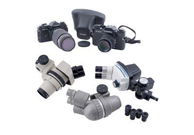 Lot 456 - Two film cameras; and three microscopes