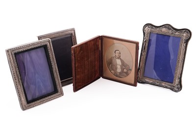 Lot 450 - Three silver photograph frames; and an 1860s cabinet card in union-type case