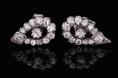 Lot 710 - A pair of diamond earrings