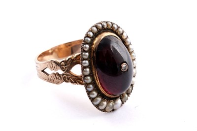Lot 495 - A Georgian garnet, pearl and diamond ring