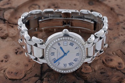 Lot 415 - Longines PrimaLuna: a stainless steel cased lady's wristwatch