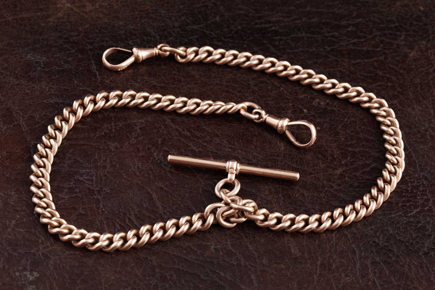 Lot 291 - An early 20th Century 9ct rose gold double "Albert" watch chain