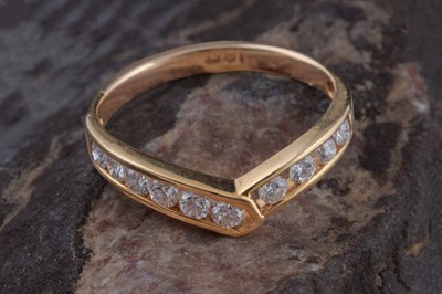 Lot 296 - A modern diamond half hoop eternity ring