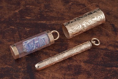 Lot 297 - A 9ct gold "break glass" banknote pendant; and a yellow-metal fob pencil