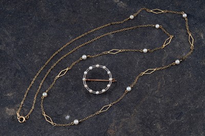 Lot 301 - An early 20th Century Art Deco seed pearl annulus brooch; and necklace