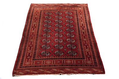 Lot 114 - A mid-20th Century hand-knotted Tekke Turkoman-style rug
