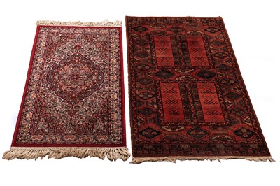 Lot 72 - An Isfahan-style; and a Turkoman-style rug