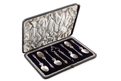 Lot 400 - Apostle type teaspoons and sugar tongs