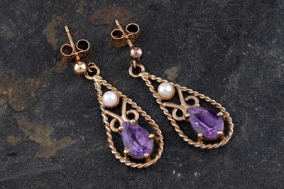 Lot 338 - A pair of Victorian style amethyst and seed pearl pendant earrings