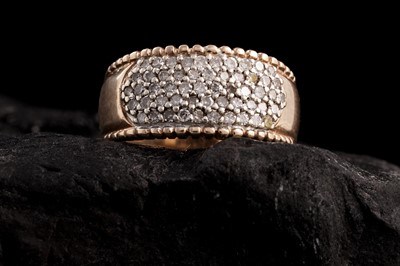 Lot 318 - A modern diamond half hoop eternity ring