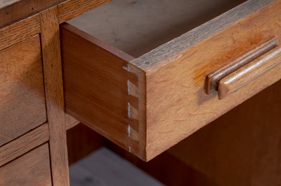 Lot 38 - An early 20th Century Art Deco oak kneehole desk