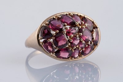 Lot 242 - A pink tourmaline dress ring