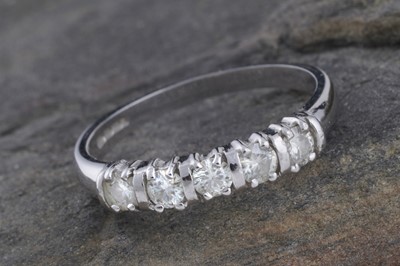 Lot 252 - A contemporary Charles & Colvard moissanite eternity ring
