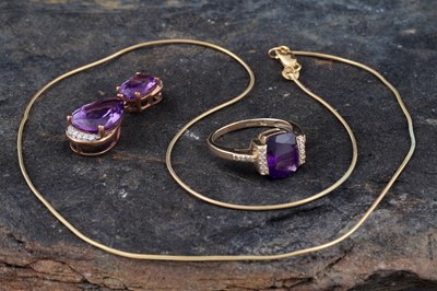 Lot 253 - A contemporary amethyst and diamond pendant necklace; and conforming ring