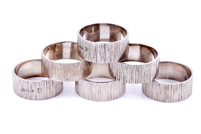 Lot 134 - An Elizabeth II set of six Irish provincial silver napkin rings