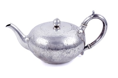 Lot 56 - A Victorian engraved silver teapot
