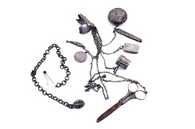 Lot 351 - A Dutch silver chatelaine clip with non-matching fittings on chains; and a silver belt hook