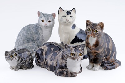 Lot 248 - Five ceramic cats, including three Winstanley