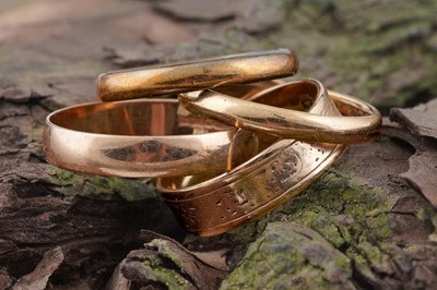 Lot 216 - Four 9ct gold wedding bands