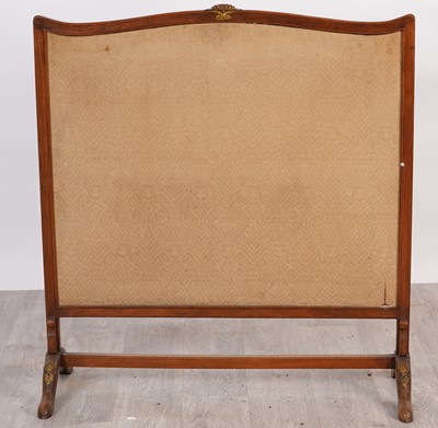 Lot 203 - An early 20th Century walnut fire screen