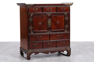 Lot 15 - A Korean style brass mounted elm cabinet
