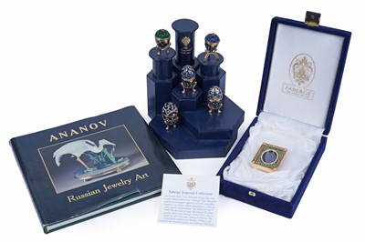 Lot 425 - The Romanoff Collection: five enamelled eggs; and a boxed Faberge Imperial Collection photo frame