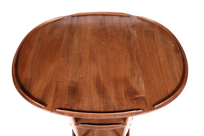 Lot 23 - Ercol: an elm and beech model 505 drop leaf trolley