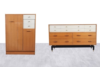 Lot 96 - E Gomme for G Plan: an oak 'China White' chest of drawers and wardrobe