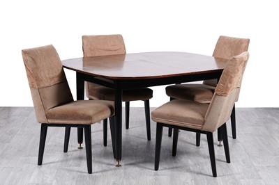 Lot 97 - E Gomme for G Plan: a 'Librenza' tola wood extending dining table; and four chairs