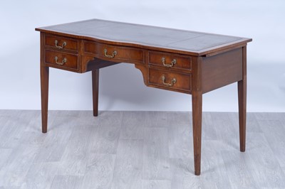 Lot 19 - A Georgian-style serpentine-fronted writing desk