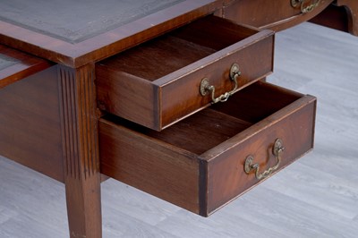 Lot 19 - A Georgian-style serpentine-fronted writing desk