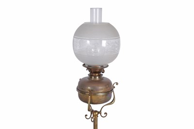 Lot 108 - A late 19th/early 20th Century Art Nouveau brass standard oil lamp; and a three branch lamp