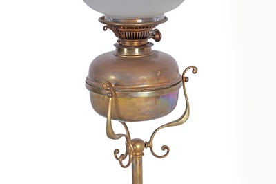 Lot 108 - A late 19th/early 20th Century Art Nouveau brass standard oil lamp; and a three branch lamp
