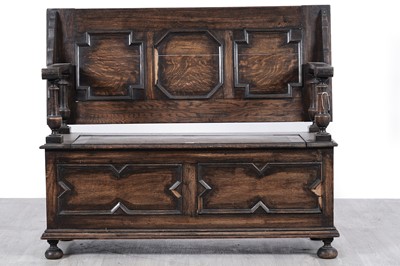 Lot 77 - An early 20th Century oak monk’s bench