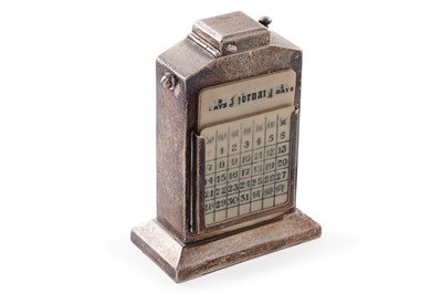 Lot 429 - A 1930s silver perpetual calendar and lighter