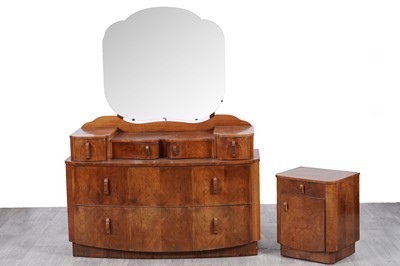 Lot 80 - An Art Deco walnut dressing table; and an Art Deco walnut bedside cabinet