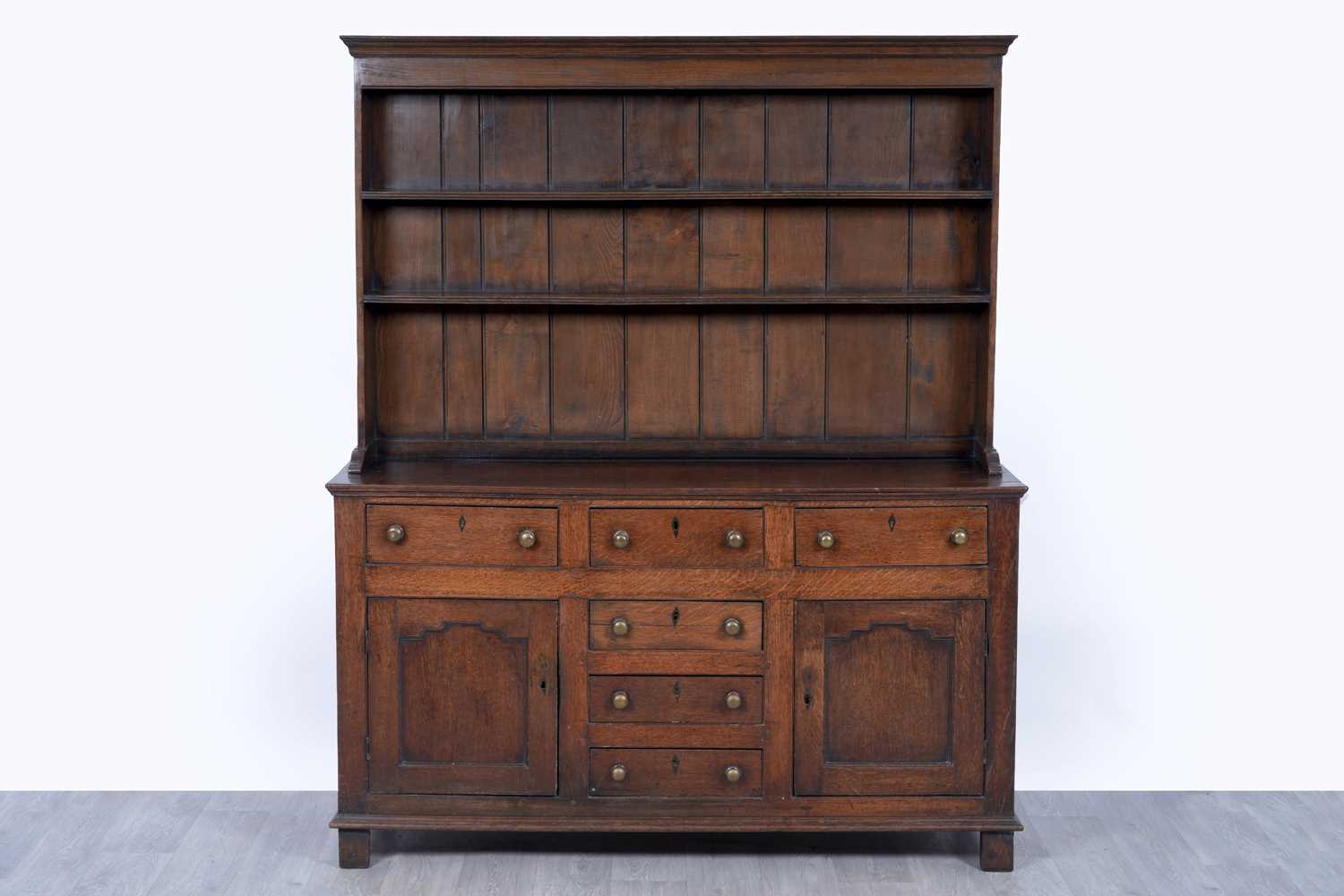 Lot 41 - A Georgian oak dresser